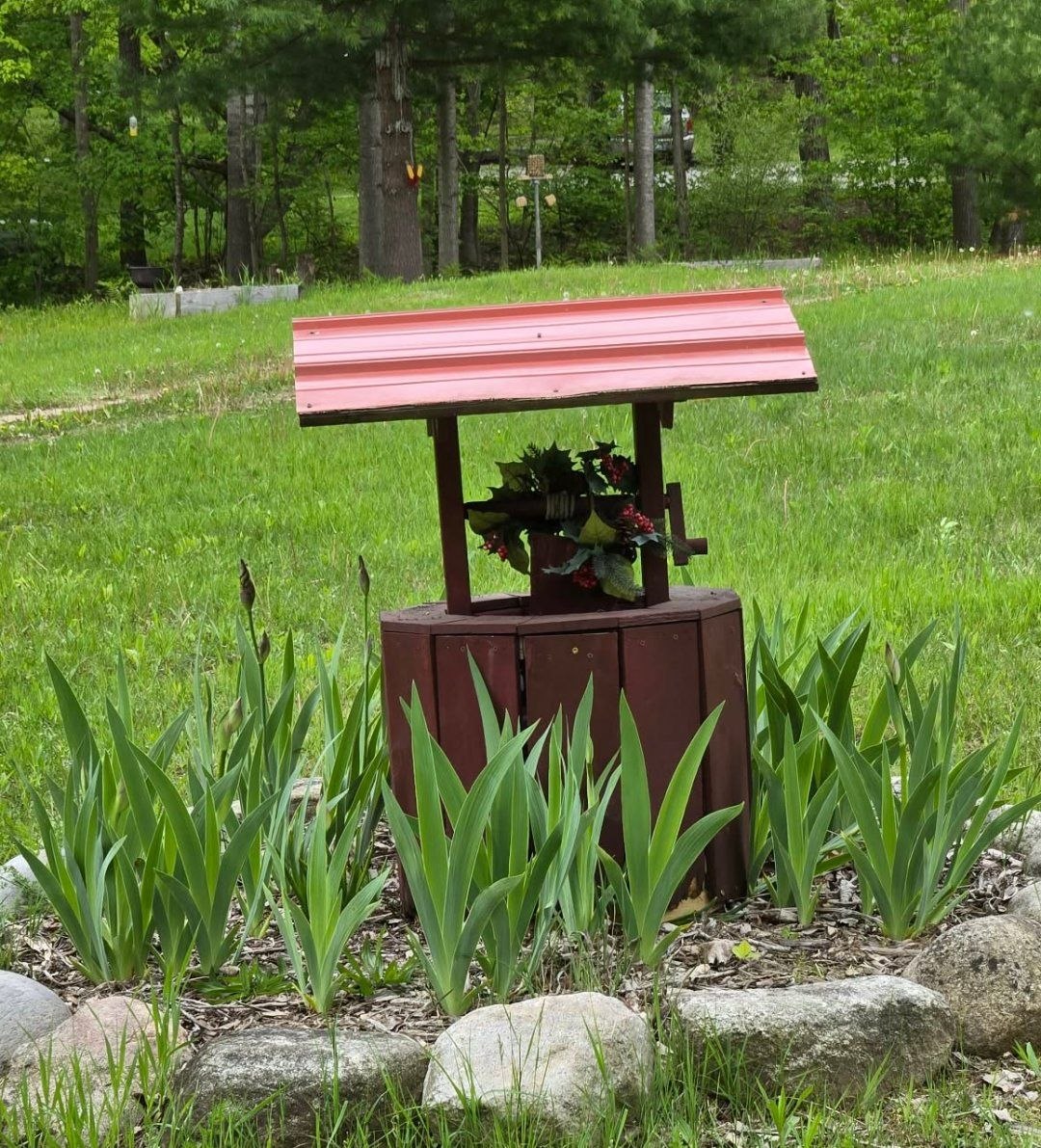 The repaired wishing well brought back to the cabin as a free yard sale find