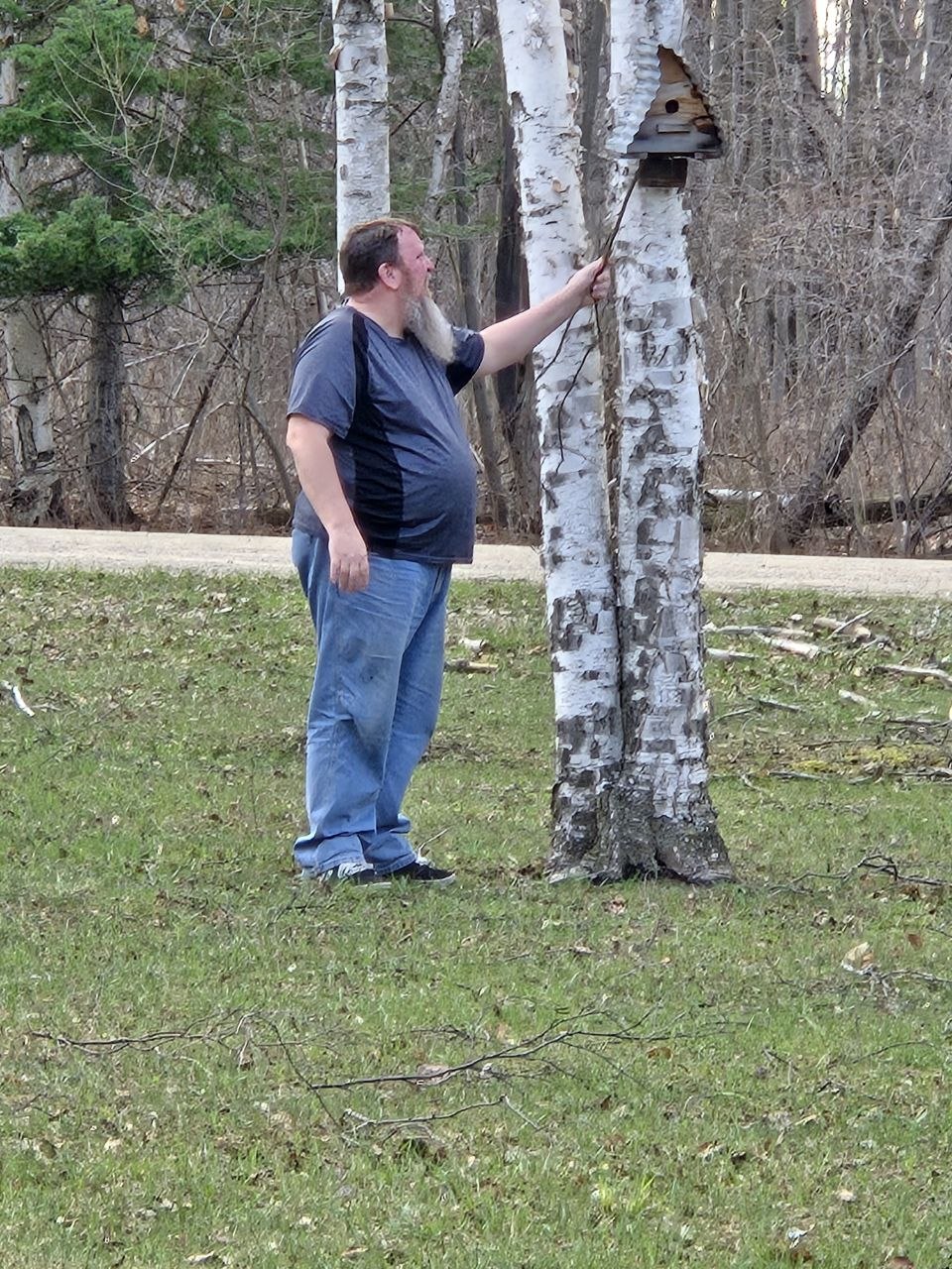 Cleaning out one of the birdhouses so the spring birds can start fresh for the season