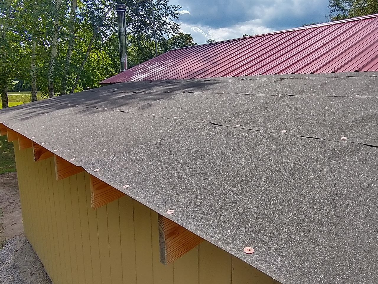 Unfinished roof detail showing work the previous owner never completed
