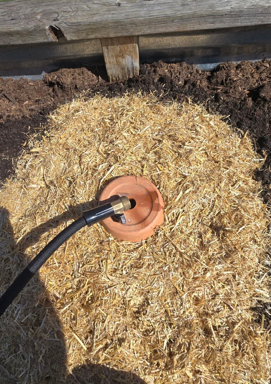Two pot olla filled with water after installation